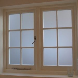 Satin glass casement window